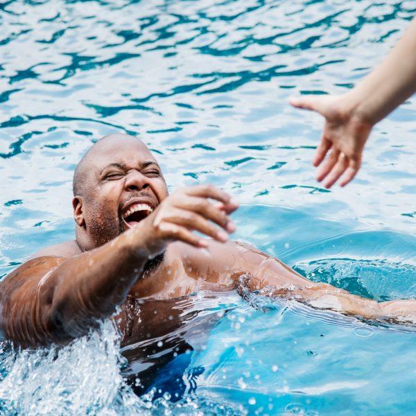 Man being rescued from the water